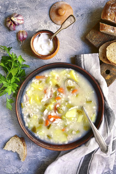 Rassolnik - traditional russian soup with pickled cucumber and c