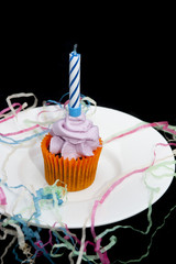 Cupcake with extinguished candle