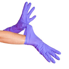 Nurse putting on medical glove isolated on white.