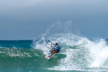 Amazing kite surfing at Philippines. Processional instructor surfing in ocean waives © PerfectLazybones