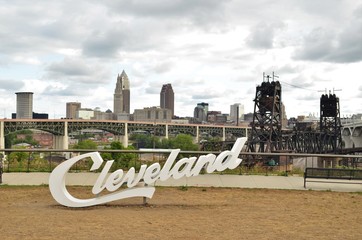 View of Cleveland sign and skyline on cloudy day