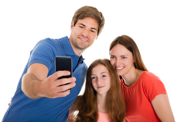 Parent Taking Selfie With Their Daughter