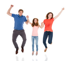 Happy Family Jumping Together
