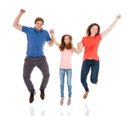 Obraz premium Happy Family Jumping Together