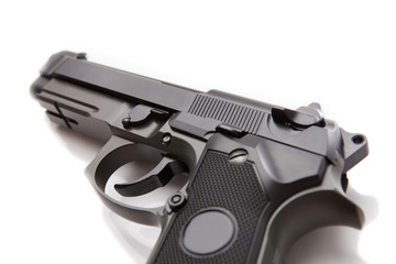 Obraz premium Hand gun with no logos or serial numbers - close up studio shot on white