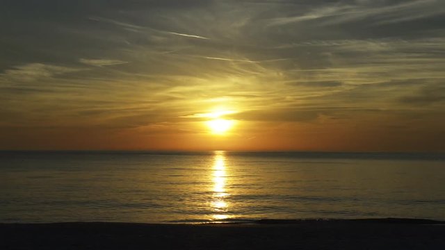 Sunset on the beach, Beach sunset with people, timelapse, Anna Maria Island, Florida.