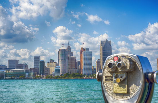 Binoculars overseeing Detroit city skyline