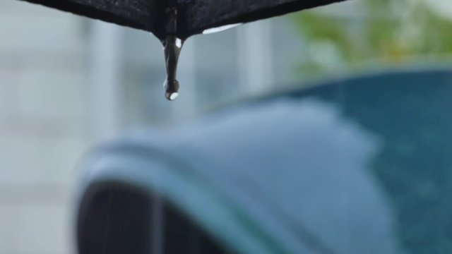 Rain drips and splashes of scatters in the telephone booth