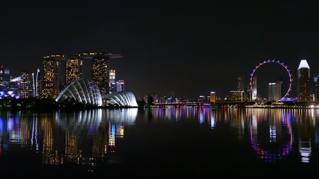 Aerial view of Singapore city skyline at night at Marina Bay, Singapore