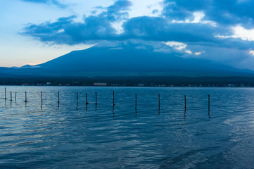Mount Fuji on dusk with lake Yamanaka on the foreground