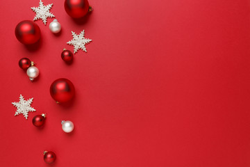 Christmas ornaments decorations background. Classic red and white glass baubles balls with giltter...