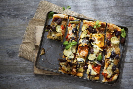 Homemade Roasted Vegetable Pizza with Olives, Basil and Peppers,