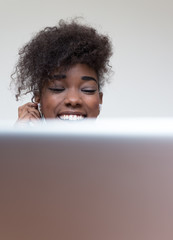 Portrait of smiling afro-american office worker in offfice