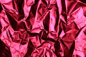 Red foil  crumpled paper background