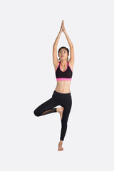 Obraz na płótnie Canvas Young woman in yoga pose.