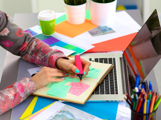 Designer working at desk using digitizer in his office