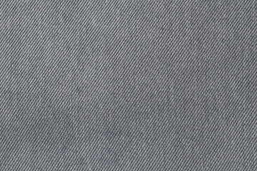 Fototapeta na wymiar fabric pattern texture of denim or black jeans.
