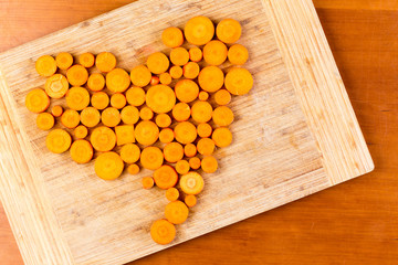 Chopped carrots arranged in heart shape