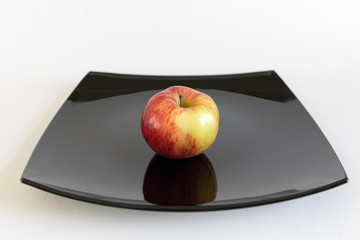 apple on a square plate