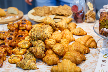 Croissants lay on the counter for confectionery shop. Actually,