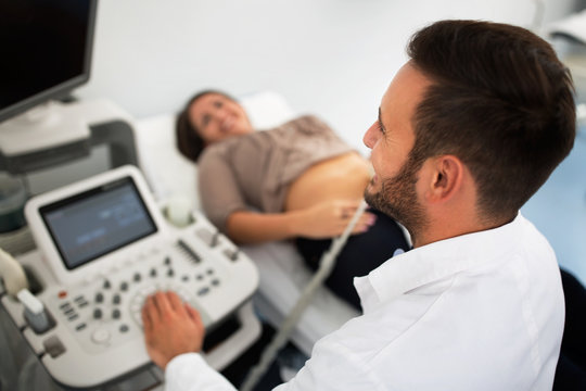 Ginecologist doing ultrasound exam