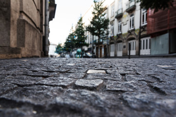 Fototapeta na wymiar Cobblestones in Porto city, Portugal.