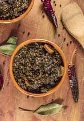 Lentil stew, shot from above, with bay leaves