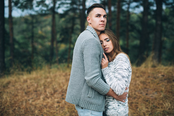 Fototapeta premium Stylish and fashionable young beautiful happy couple posing. Boho style.