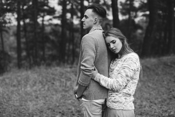 Stylish and fashionable young beautiful happy couple posing. Boho style.