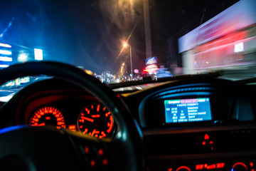 drunk driver goes at night. view from inside. abstract