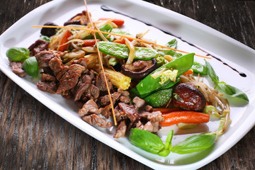 Chinese salad with wheat germs and meat.