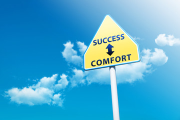 Road Sign with word : Success and Comfort on Cloudy Blue Sky Background, Decision Concept