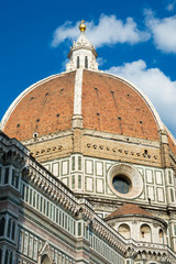 Fototapeta na wymiar Dome of cathedral church Santa Maria del Fiore close up, Florence, Italy - Vertical view