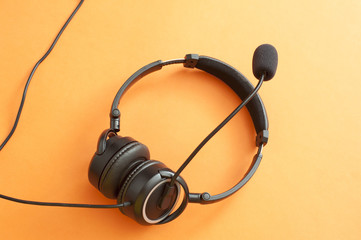 Headset with microphone on orange