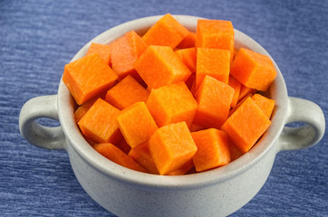 fresh and juicy slices of pumpkin in a pot