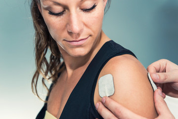 Electrodes of tens device on shoulder