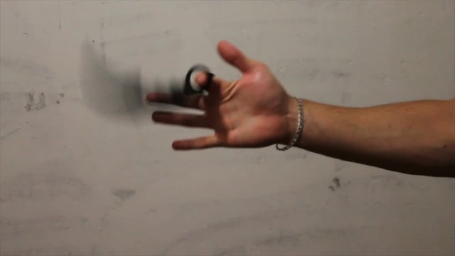 KARAMBIT knife in the hand of a young man