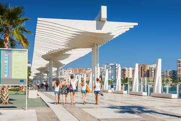 Sunny view of promenade near port of Malaga, Andalusia province, Spain.