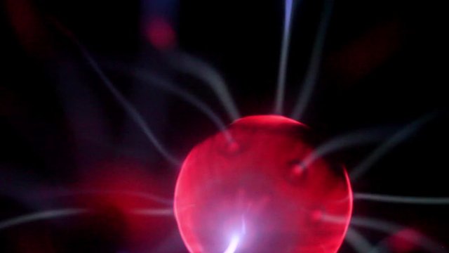 Plasma ball energy lightning touching finger abstract background electricity lightning 