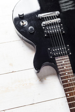 Electric guitar on old wooden surface