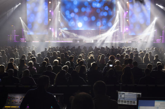 Empty Parterre In A Concert Hall.
People In The Stalls Of The Auditorium