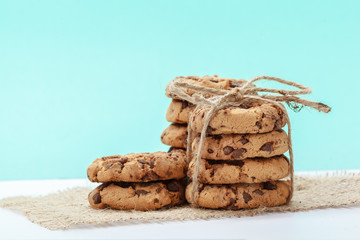 chocolate chunk cookies on a bright blue background