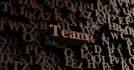 Team - Wooden 3D rendered letters/message.  Can be used for an online banner ad or a print postcard.