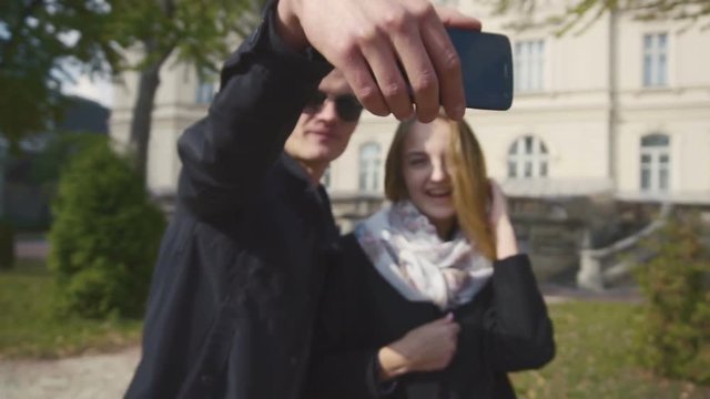 Young Couple Makes a Selfie