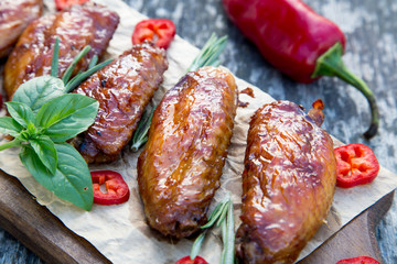 Baked spicy chicken wings in the Asian style