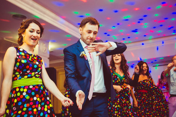 Groom and bridesmaids dance like robots