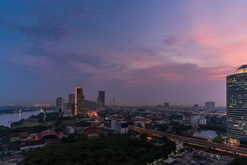 Naklejka na ściany i meble Cityscape of Bangkok on foggy day in twilight , Thailand