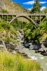 Fototapeta premium wooden bridge over shotover river at Queenstown