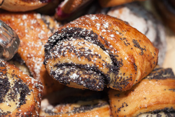 baked sweet rolls with poppy seeds