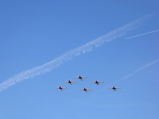 Six planes fly in formation